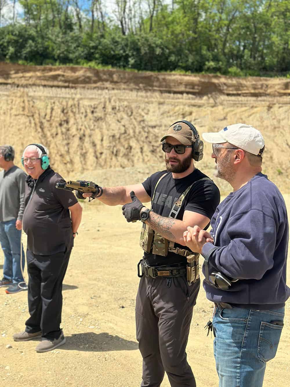 Joe Teaching Handgun Basics to student